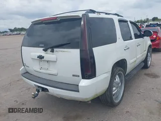 2009 Chevrolet Tahoe 2LT z VIN 1GNFC23059R156494, wystawiony jako IAAI lot #42423722 z przebiegiem Nie podano mil oraz . Historia ofert i sprzedaży dostępna na DreamBid. Obrazek 4.