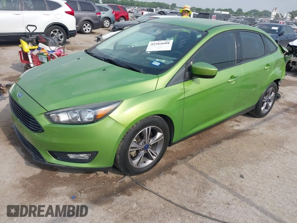 2018 Ford Focus SE z VIN 1FADP3FE5JL222542, wystawiony jako IAAI lot #42265608 z przebiegiem 107 397 mil mil oraz . Historia ofert i sprzedaży dostępna na DreamBid. Obrazek 17.
