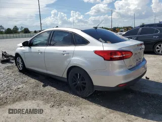 2016 Ford Focus SE z VIN 1FADP3F24GL309119, wystawiony jako Copart lot #62279095 z przebiegiem 117 535 mil mil oraz Szkoda całkowita • Salvage title. Historia ofert i sprzedaży dostępna na DreamBid. Obrazek 2.