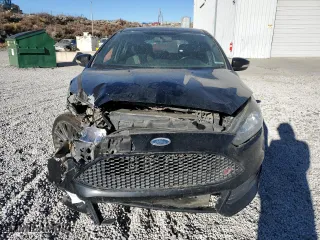 2017 Ford Focus ST with VIN 1FADP3L96HL334011, listed as a Copart auction lot 88313875 with 114,344 mi miles and Salvage Title. Bid and sale history available at carsss.com. Image 5.