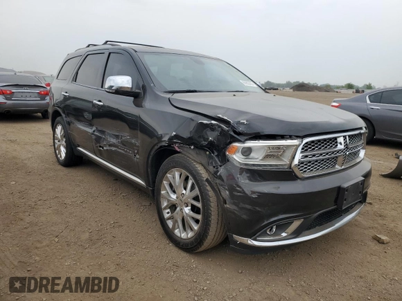 2015 Dodge Durango Citadel with VIN 1C4SDHET2FC771291, listed as a Copart auction lot 60902455 with 130,206 mi miles and Salvage title. Bid and sale history available at DreamBid. Image 4.