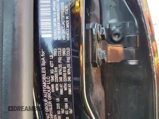 2015 Jeep Renegade Limited z VIN ZACCJADT5FPB20058, wystawiony jako Copart lot #60619395 z przebiegiem 122 982 mil mil oraz Szkoda całkowita • Salvage title. Historia ofert i sprzedaży dostępna na DreamBid. Obrazek 14.