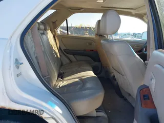 1999 Lexus RX 300 Luxury SUV with VIN JT6HF10U9X0078840, listed as a IAAI auction lot 41361325 with 231,519 mi miles. Bid and sale history available at carsss.com. Image 8.