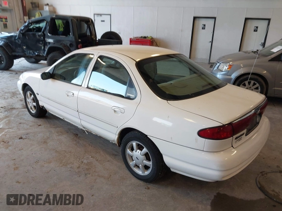 1999 Ford Contour SE z VIN 1FAFP6634XK138025, wystawiony jako IAAI lot #42436185 z przebiegiem 90 226 mil mil oraz . Historia ofert i sprzedaży dostępna na DreamBid. Obrazek 3.