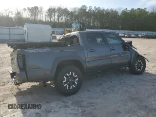 2017 Toyota Tacoma SR5 z VIN 3TMCZ5AN2HM057612, wystawiony jako Copart lot #48394765 z przebiegiem 106 579 mil mil oraz Szkoda całkowita • Salvage title. Historia ofert i sprzedaży dostępna na DreamBid. Obrazek 3.