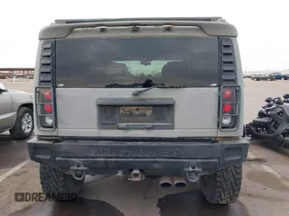 2003 Hummer H2 with VIN 5GRGN23U13H128617, listed as a IAAI auction lot 41494349 with 135,295 mi miles. Bid and sale history available at carsss.com. Image 16.