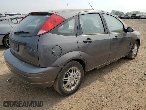 2005 Ford Focus S with VIN 3FAFP37NX5R134987, listed as a Copart auction lot 60478825 with 204,927 mi miles and Clean title. Bid and sale history available at DreamBid. Image 3.