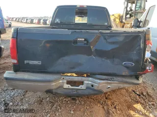 1999 Ford Super Duty F-250 XL with VIN 1FTNW20S1XEB31761, listed as a Copart auction lot 69896824 with 258,152 mi miles and Salvage Title. Bid and sale history available at carsss.com. Image 6.