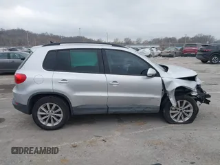 2015 Volkswagen Tiguan SE with VIN WVGAV7AX5FW592216, listed as a IAAI auction lot 41401020 with 110,726 mi miles and . Bid and sale history available at DreamBid. Image 14.