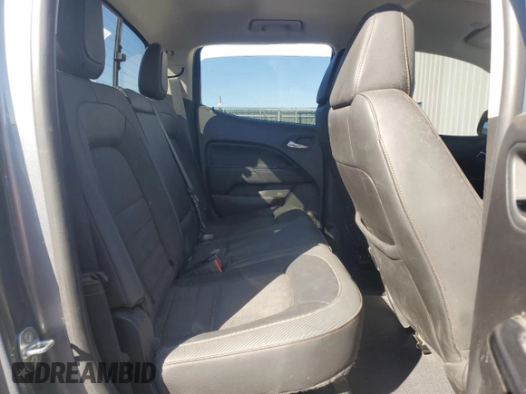 2021 GMC Canyon 4WD AT4 w/Leather with VIN 1GTG6FEN3M1180062, listed as a Copart auction lot 48116395 with 73,933 mi miles and Salvage Title. Bid and sale history available at carsss.com. Image 10.