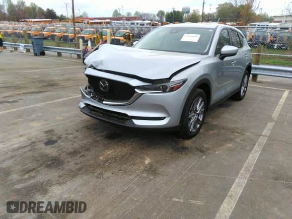 2019 Mazda CX-5 Grand Touring with VIN JM3KFADM2K1631928, listed as a IAAI auction lot 41961695 with 41,190 mi miles. Bid and sale history available at carsss.com. Image 2.