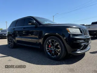 2012 Jeep Grand Cherokee SRT8 with VIN 1C4RJFDJ2CC111226, listed as a Copart auction lot 74449424 with 113,515 mi miles and Clean Title. Bid and sale history available at carsss.com. Image 1.