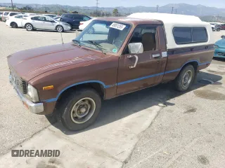 1981 Toyota Pickup z VIN JT4RN34S9B0014777, wystawiony jako Copart lot #49951255 z przebiegiem 88 421 mil mil oraz Czysty tytuł • Clean title. Historia ofert i sprzedaży dostępna na DreamBid. Obrazek 1.