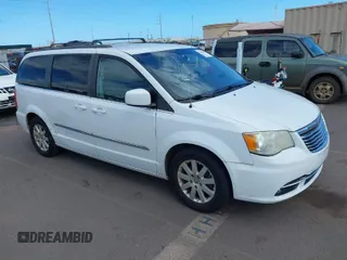 2014 Chrysler Town & Country Touring with VIN 2C4RC1BG1ER242842, listed as a IAAI auction lot 42043861 with 102,448 mi miles. Bid and sale history available at carsss.com. Image 1.