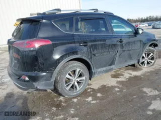 2016 Toyota RAV4 XLE with VIN 2T3WFREV7GW255784, listed as a IAAI auction lot 41266085 with 87,426 mi miles. Bid and sale history available at carsss.com. Image 4.