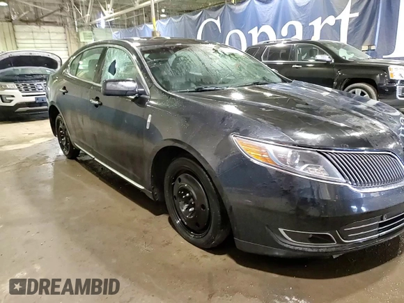 2014 Lincoln MKS z VIN 1LNHL9DK7EG610823, wystawiony jako Copart lot #47544585 z przebiegiem 131 176 mil mil oraz Czysty tytuł • Clean title. Historia ofert i sprzedaży dostępna na DreamBid. Obrazek 14.