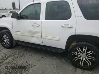 2011 GMC Yukon SLT with VIN 1GKS1CE09BR154032, listed as a Copart auction lot 69023864 with 246,494 mi miles and Salvage Title. Bid and sale history available at carsss.com. Image 11.