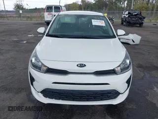 2021 Kia Rio LX with VIN 3KPA24AD0ME395186, listed as a IAAI auction lot 41865802 with 52,351 mi miles and . Bid and sale history available at DreamBid. Image 12.