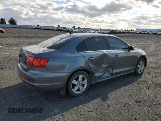 2014 Volkswagen Jetta TDI w/Premium with VIN 3VW3L7AJ4EM273755, listed as a Copart auction lot 52389795 with 184,586 mi miles and Salvage title. Bid and sale history available at DreamBid. Image 3.