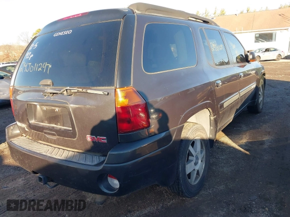 2005 GMC Envoy SLE with VIN 1GKET16SX56139511, listed as a IAAI auction lot 41234171 with Not Provided miles and . Bid and sale history available at DreamBid. Image 4.