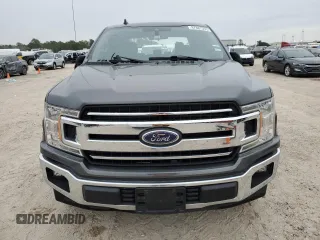 2020 Ford F-150 XL with VIN 1FTEW1CB1LKD56067, listed as a Copart auction lot 87887395 with 106,980 mi miles and Salvage Title. Bid and sale history available at carsss.com. Image 5.
