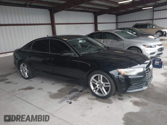 2014 Audi A6 Premium Plus with VIN WAUGFAFC1EN164580, listed as a IAAI auction lot 42220550 with 112,528 mi miles and . Bid and sale history available at DreamBid. Image 1.