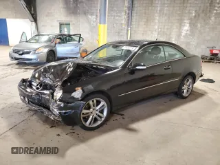 2008 Mercedes-Benz CLK-Class 3.5L with VIN WDBTJ56H08F237826, listed as a Copart auction lot 77552714 with 124,059 mi miles and Salvage Title. Bid and sale history available at carsss.com. Image 1.