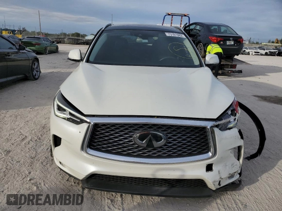 2019 Infiniti QX50 LUXE with VIN 3PCAJ5M14KF121345, listed as a Copart auction lot 73101062 with 58,848 mi miles. Bid and sale history available at carsss.com. Image 5.