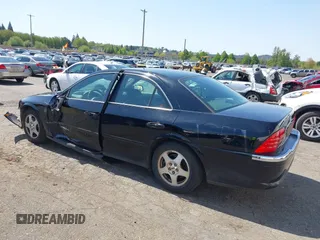 2001 Lincoln LS z VIN 1LNHM86S71Y620289, wystawiony jako IAAI lot #42105386 z przebiegiem 74 148 mil mil oraz . Historia ofert i sprzedaży dostępna na DreamBid. Obrazek 3.