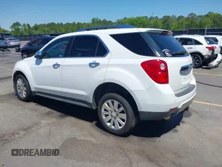 2011 Chevrolet Equinox 2LT z VIN 2CNFLPE50B6394569, wystawiony jako IAAI lot #42008653 z przebiegiem 238 617 mil mil oraz . Historia ofert i sprzedaży dostępna na DreamBid. Obrazek 3.