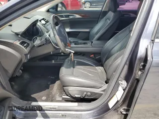 2014 Lincoln MKZ z VIN 3LN6L2G97ER822718, wystawiony jako Copart lot #55264075 z przebiegiem 141 738 mil mil oraz Szkoda całkowita • Salvage title. Historia ofert i sprzedaży dostępna na DreamBid. Obrazek 7.