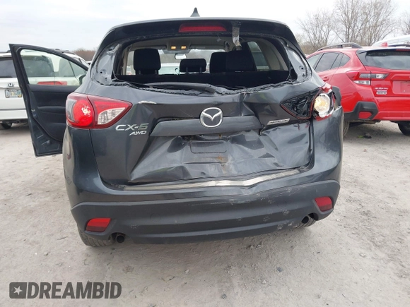 2015 Mazda CX-5 Touring with VIN JM3KE4CY1F0439016, listed as a IAAI auction lot 42039259 with 201,325 mi miles and . Bid and sale history available at carsss.com. Image 6.