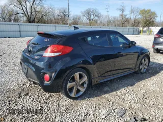 2015 Hyundai Veloster Turbo with VIN KMHTC6AE9FU217724, listed as a Copart auction lot 49740814 with 125,625 mi miles and Clean Title. Bid and sale history available at carsss.com. Image 3.