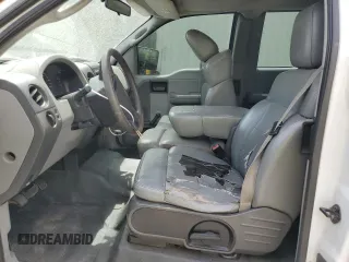 2005 Ford F-150 STX with VIN 1FTRX12W55NA33581, listed as a Copart auction lot 53717995 with 291,549 mi miles and Salvage title. Bid and sale history available at DreamBid. Image 7.