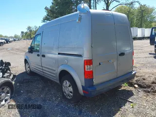 2011 Ford Transit Connect XLT with VIN NM0LS7BN3BT068980, listed as a IAAI auction lot 41746496 with 98,257 mi miles and . Bid and sale history available at DreamBid. Image 3.