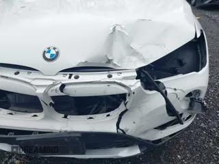 2018 BMW X1 xDrive28i with VIN WBXHT3C36J5L32162, listed as a IAAI auction lot 41802315 with 80,422 mi miles. Bid and sale history available at carsss.com. Image 6.