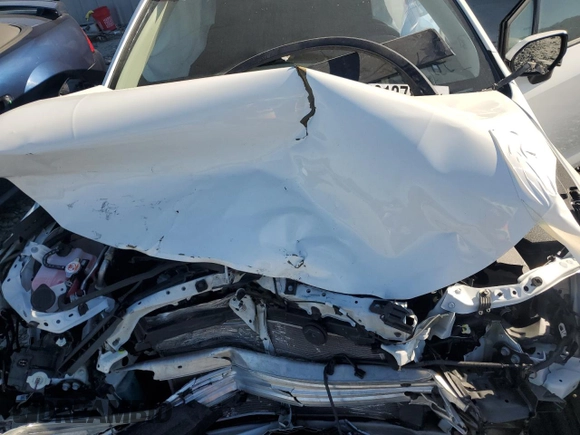 2023 Toyota Corolla LE z VIN 5YFB4MDEXPP024378, wystawiony jako Copart lot #49137835 z przebiegiem Nie podano mil oraz Szkoda całkowita • Salvage title. Historia ofert i sprzedaży dostępna na DreamBid. Obrazek 12.