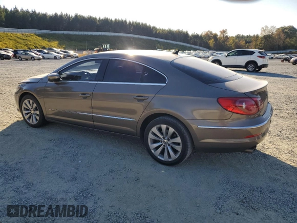 2010 Volkswagen CC Sport with VIN WVWMN7AN3AE541988, listed as a Copart auction lot 77670794 with 100,277 mi miles and Salvage Title. Bid and sale history available at DreamBid. Image 2.