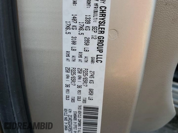 2013 Dodge Grand Caravan Crew with VIN 2C4RDGDG4DR567707, listed as a Copart auction lot 52731005 with 210,359 mi miles and Salvage Title. Bid and sale history available at DreamBid. Image 13.