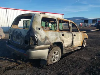 2001 Toyota Land Cruiser with VIN JTEHT05J012013084, listed as a IAAI auction lot 41671271 with 1 mi miles. Bid and sale history available at carsss.com. Image 4.