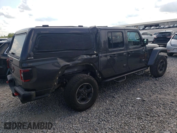 2021 Jeep Gladiator Rubicon with VIN 1C6JJTBG3ML602478, listed as a Copart auction lot 58138705 with 76,759 mi miles and Salvage title. Bid and sale history available at DreamBid. Image 3.