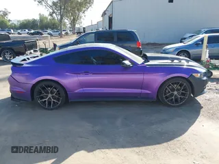 2015 Ford Mustang EcoBoost with VIN 1FA6P8TH5F5358816, listed as a IAAI auction lot 41573005 with 57,975 mi miles and . Bid and sale history available at carsss.com. Image 13.