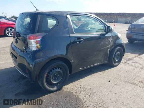 2013 Scion iQ with VIN JTNJJXB04DJ024322, listed as a IAAI auction lot 42618525 with 154,559 mi miles and . Bid and sale history available at DreamBid. Image 4.