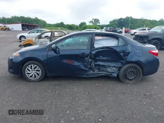 2018 Toyota Corolla L with VIN 2T1BURHEXJC003674, listed as a IAAI auction lot 42511551 with 184,697 mi miles and . Bid and sale history available at DreamBid. Image 14.