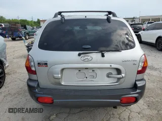 2002 Hyundai Santa Fe GLS with VIN KM8SC13D32U179968, listed as a Copart auction lot 60551434 with 77,676 mi miles and Clean Title. Bid and sale history available at carsss.com. Image 6.
