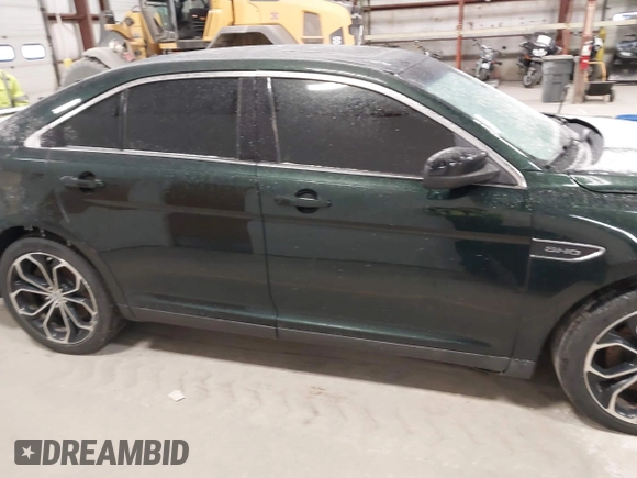 2013 Ford Taurus SHO z VIN 1FAHP2KT8DG142620, wystawiony jako IAAI lot #41800583 z przebiegiem 175 812 mil mil oraz . Historia ofert i sprzedaży dostępna na DreamBid. Obrazek 14.