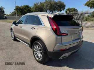 2023 Cadillac XT4 AWD Premium Luxury with VIN 1GYFZDR40PF108407, listed as a Copart auction lot 54799365 with 8,724 mi miles and Non Repairable. Bid and sale history available at carsss.com. Image 2.