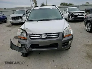 2005 Kia Sportage LX with VIN KNDJF723057125954, listed as a Copart auction lot 79454554 with 179,811 mi miles and Salvage Title. Bid and sale history available at carsss.com. Image 12.
