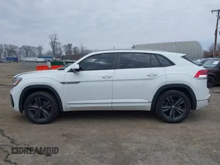 2021 Volkswagen Atlas SE z VIN 1V2RE2CA2MC205086, wystawiony jako IAAI lot #41902654 z przebiegiem 111 024 mil mil oraz . Historia ofert i sprzedaży dostępna na DreamBid. Obrazek 14.