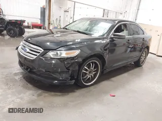 2011 Ford Taurus SEL with VIN 1FAHP2EW4BG160633, listed as a IAAI auction lot 41778406 with 125,934 mi miles. Bid and sale history available at carsss.com. Image 2.